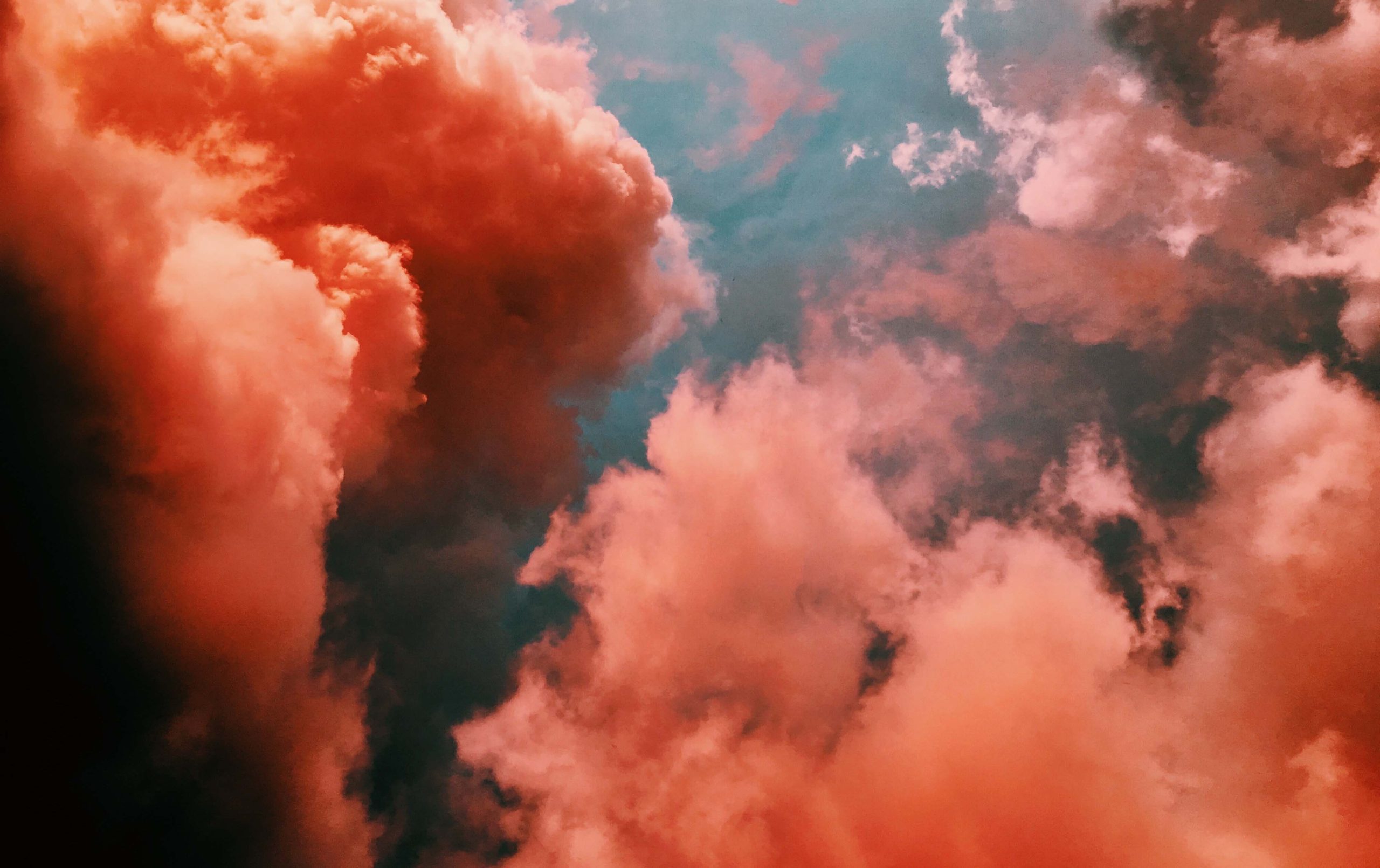 Image of pink clouds in a blue sky