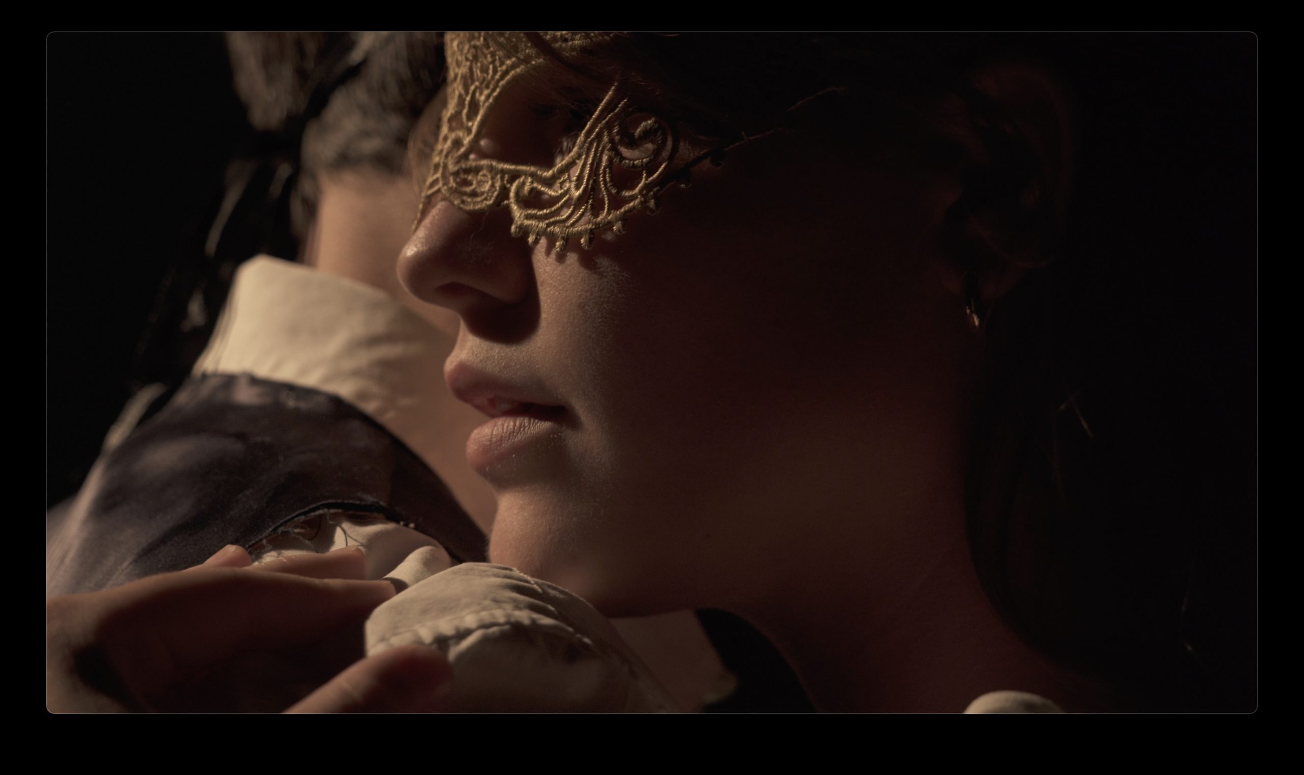 Woman with an eye mask on
