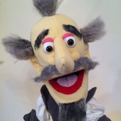 A puppet looking into the camera