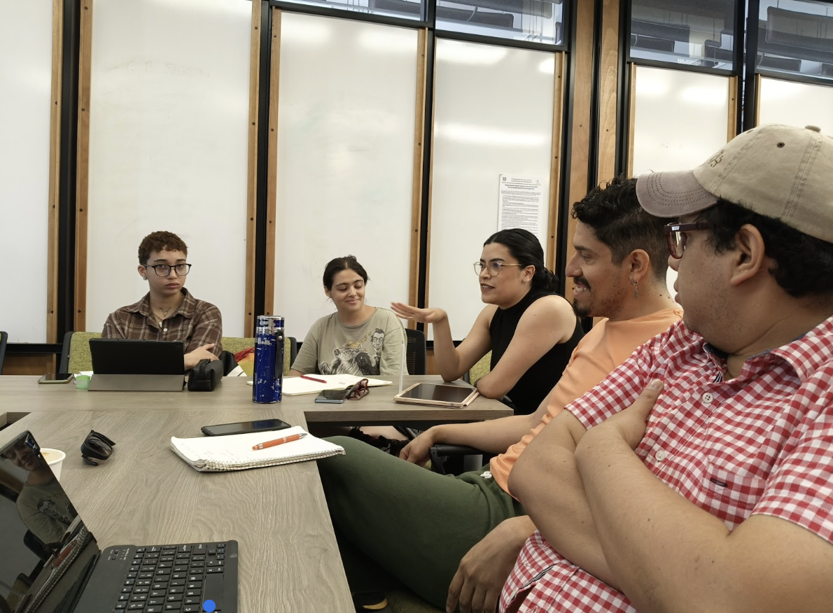 a group of students sitting at a table